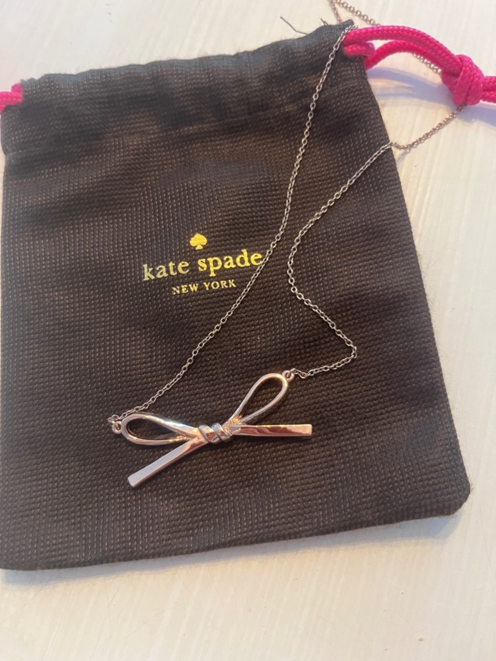 kate spade Rose Gold Bow Pendant Necklace with Branded Pouch - Picture 3 of 4